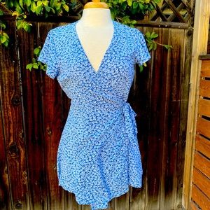 H&M dress. Cute floral wraparound. Perfect summer into fall dress.